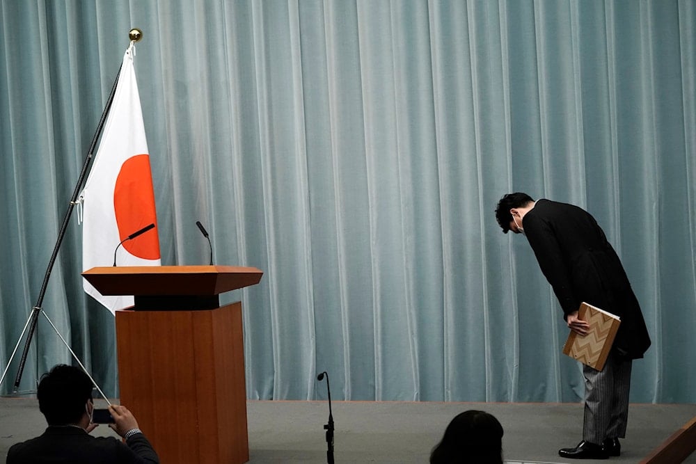 Shinjiro Koizumi, Minister of the Environment, bows before speaking during a press conference at the prime minister's official residence on September 17, 2020, in Tokyo. (AP)