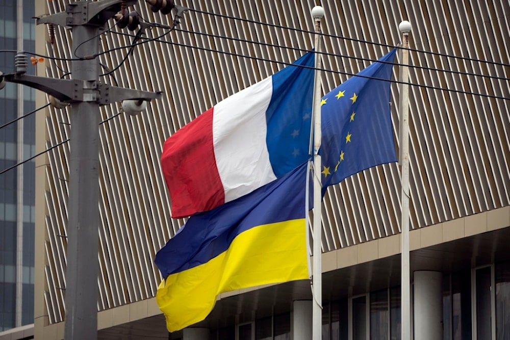 The flags of France, Ukraine, and the European Union fly at the French Embassy in Beijing, Wednesday, May 17, 2023.  (AP)