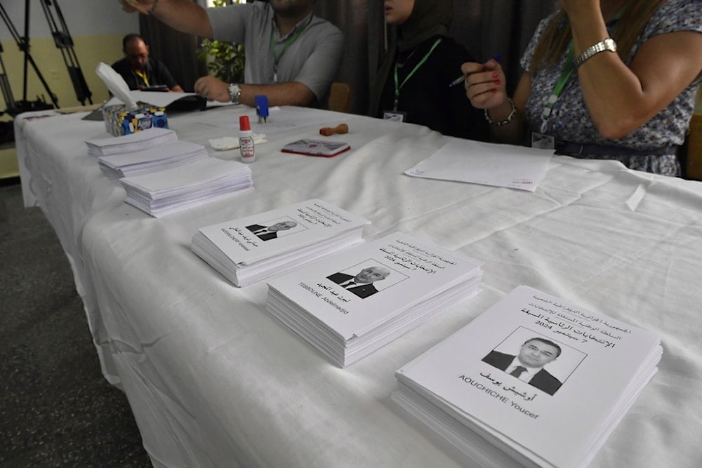 Ballots showing presidential candidates inside a polling station during the presidential election, Saturday, Sept. 7, 2024, in Algiers, Algeria. (AP Photo/Fateh Guidoum)