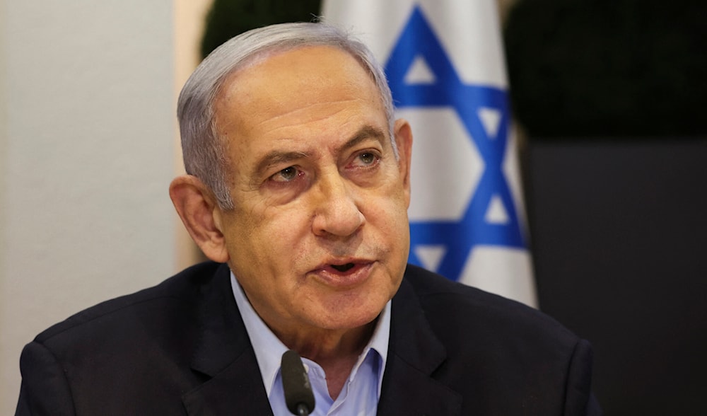 Israeli Prime Minister Benjamin Netanyahu heads the weekly cabinet meeting at the Defense Ministry in Tel Aviv on January 7, 2024. (AFP)