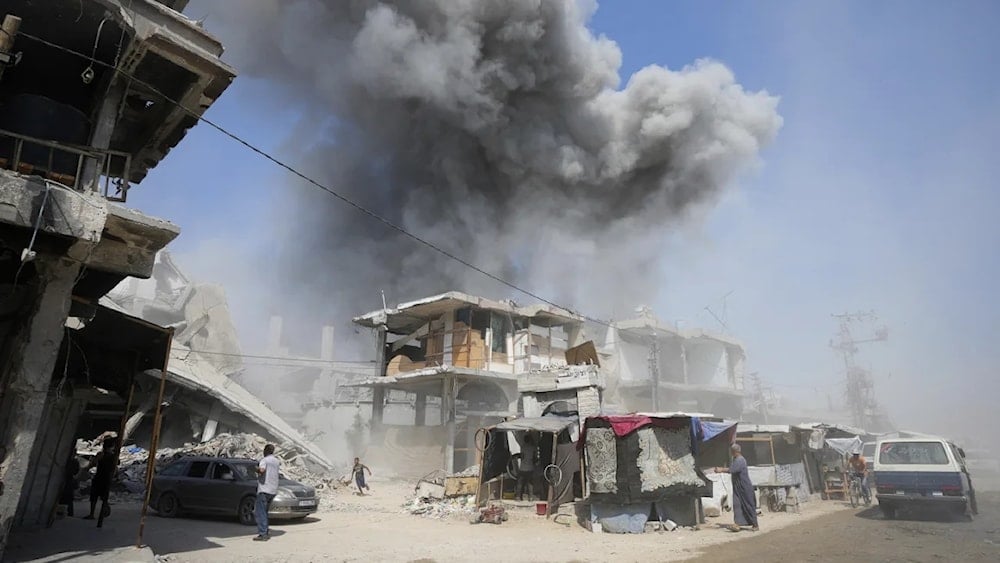 Smoke rises following Israeli bombardments in Khan Younis in the Gaza Strip, July 22, 2024. (AFP)