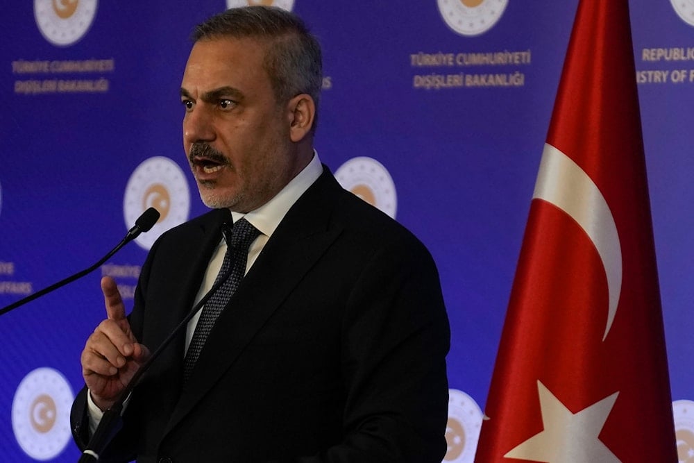 Turkey's Foreign Minister, Hakan Fidan, answers questions from media members during a press conference in Istanbul, Turkey, on January 10, 2025. (AP)