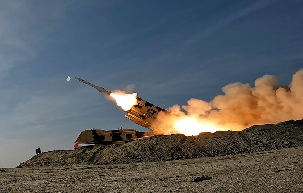 In this photo released by the Iranian Army on Friday, Jan. 19, 2024, a missile is launched during a military drill in southern Iran (AP)