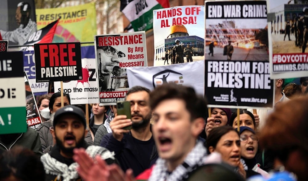 Pro-Palestinian protesters take part at a demonstration on Al Quds Day, in London, Friday, April 5, 2024. (AP)