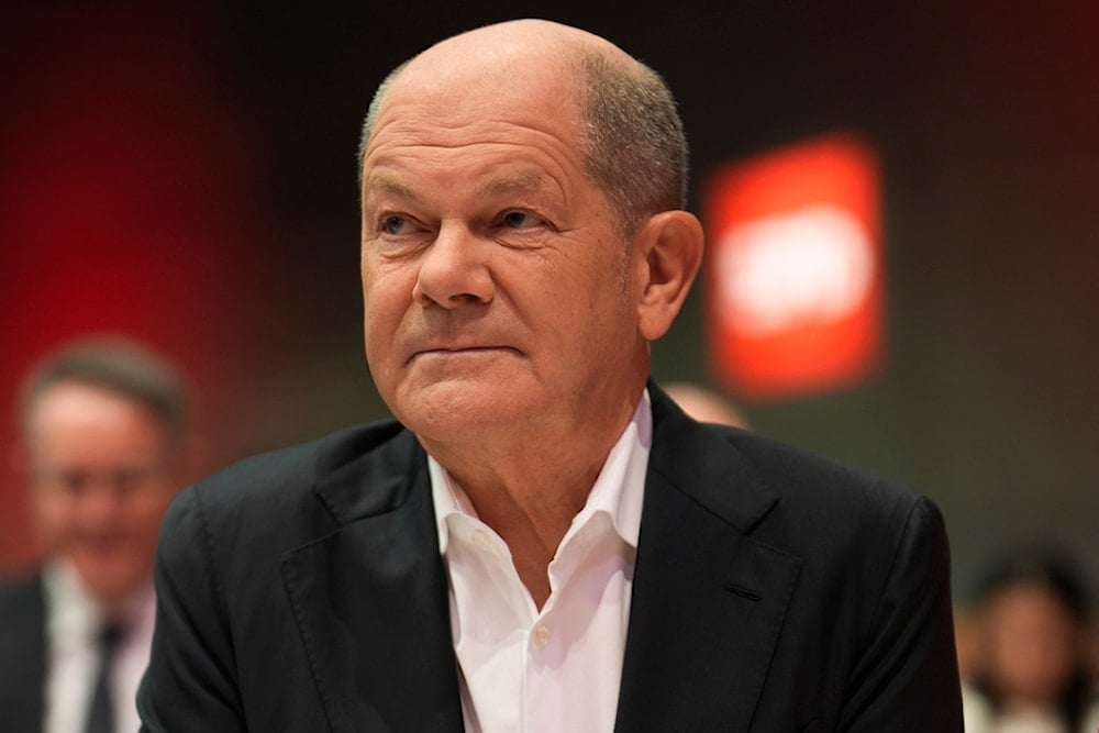 German Chancellor Olaf Scholz attends a special party convention in Berlin, Germany, Saturday, Jan. 11, 2025. (AP Photo/Markus Schreiber)