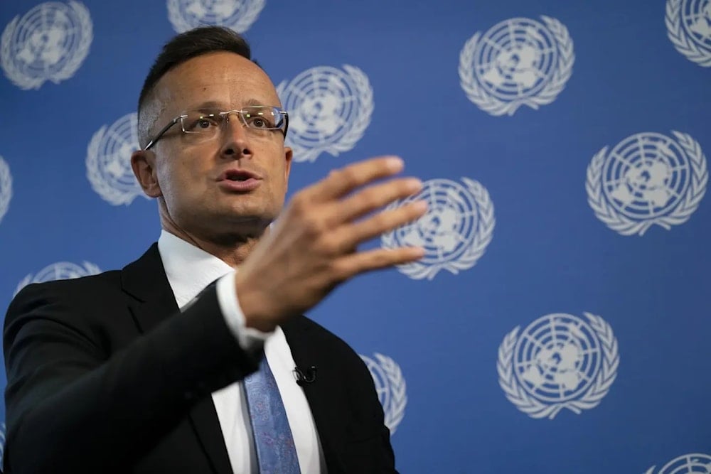 Hungarian Foreign Minister Peter Szijjarto speaks during an interview with the AP at the United Press headquarters, Thursday September 23, 2021 during the 76th Session of the UN General Assembly in New York (AP)