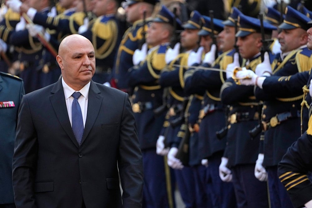 Newly-elected Lebanese President Joseph Aoun reviews the honor guard upon his arrival at the Lebanese Parliament to be sworn in as a new president, in Beirut, Lebanon, on January 9, 2025. (AP)