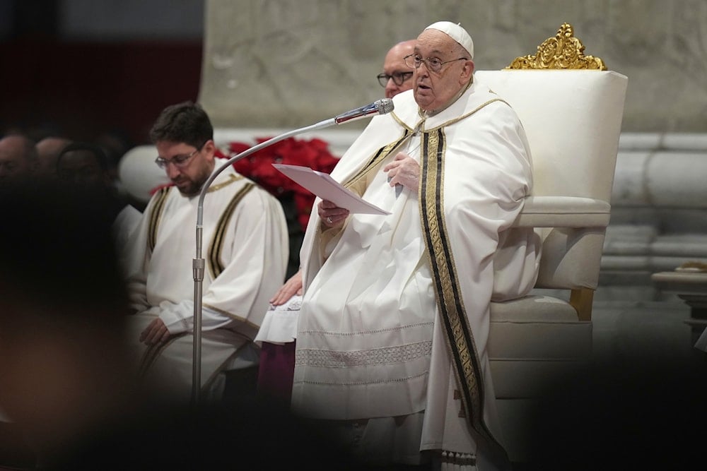 Pope Francis delivers his speech as he presides over an Epiphany mass in St. Peter's Basilica, at the Vatican, on January 6, 2025. (AP)