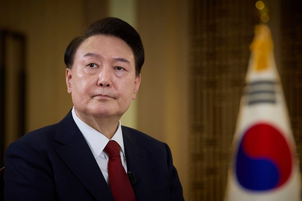 South Korean President Yoon Suk Yeol speaks during a pre-recorded interview for KBS television at the presidential office in Seoul, South Korea, Sunday, Feb. 4, 2024 (AP)