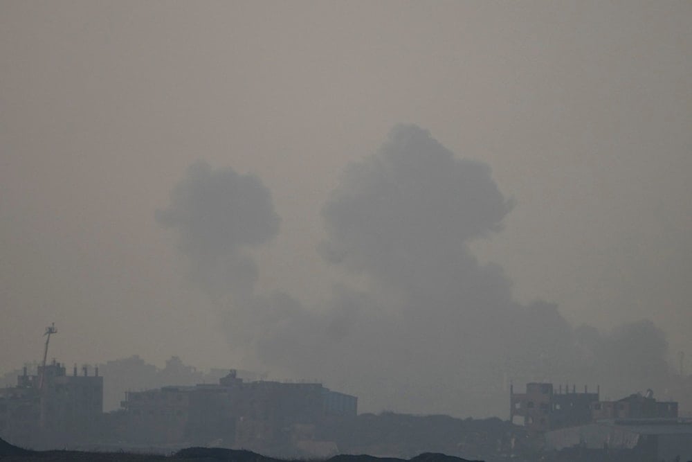 Smoke rises following an Israeli airstrike in the Gaza Strip, as seen from southern occupied Palestine, Thursday, Jan. 16, 2025 (AP)