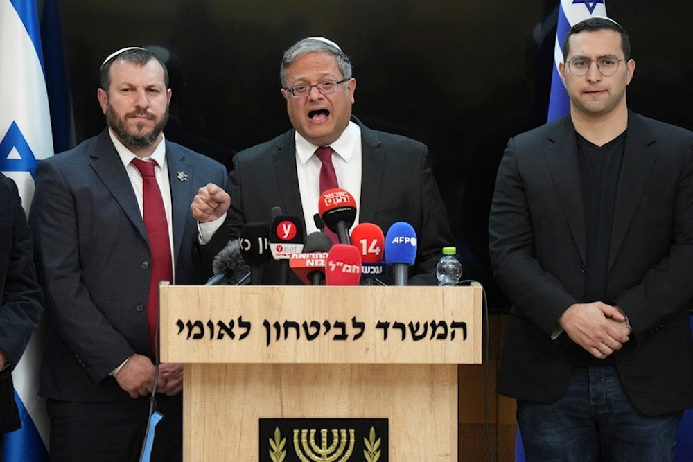 Israeli far-right Police Minister Itamar Ben-Gvir, center, in a statement to the media at his office in occupied al-Quds, occupied Palestine, on Thursday, January 16, 2025 (AP)