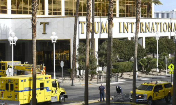 Clark County Fire Department crews work outside Trump International Hotel in Las Vegas after the fire and explosion of a Tesla Cybertruck in the valet area, on Wednesday, January 1, 2025.(AP)