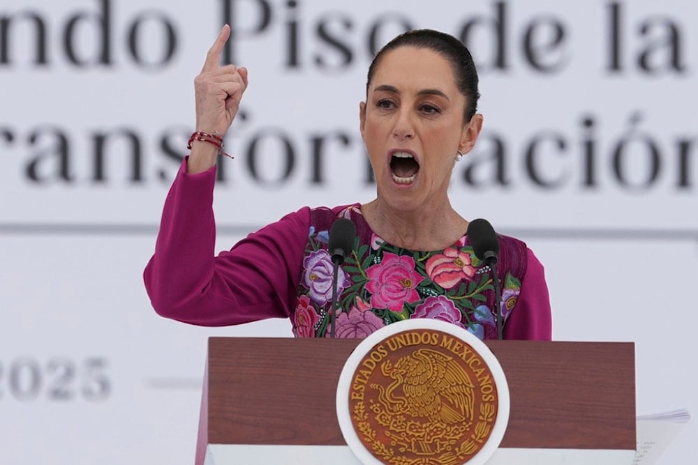 President Claudia Sheinbaum speaks to the crowd during an event marking her first 100 days in office, at the Zócalo, Mexico City's main square, in Mexico City, Sunday, Jan. 12, 2025. (AP)