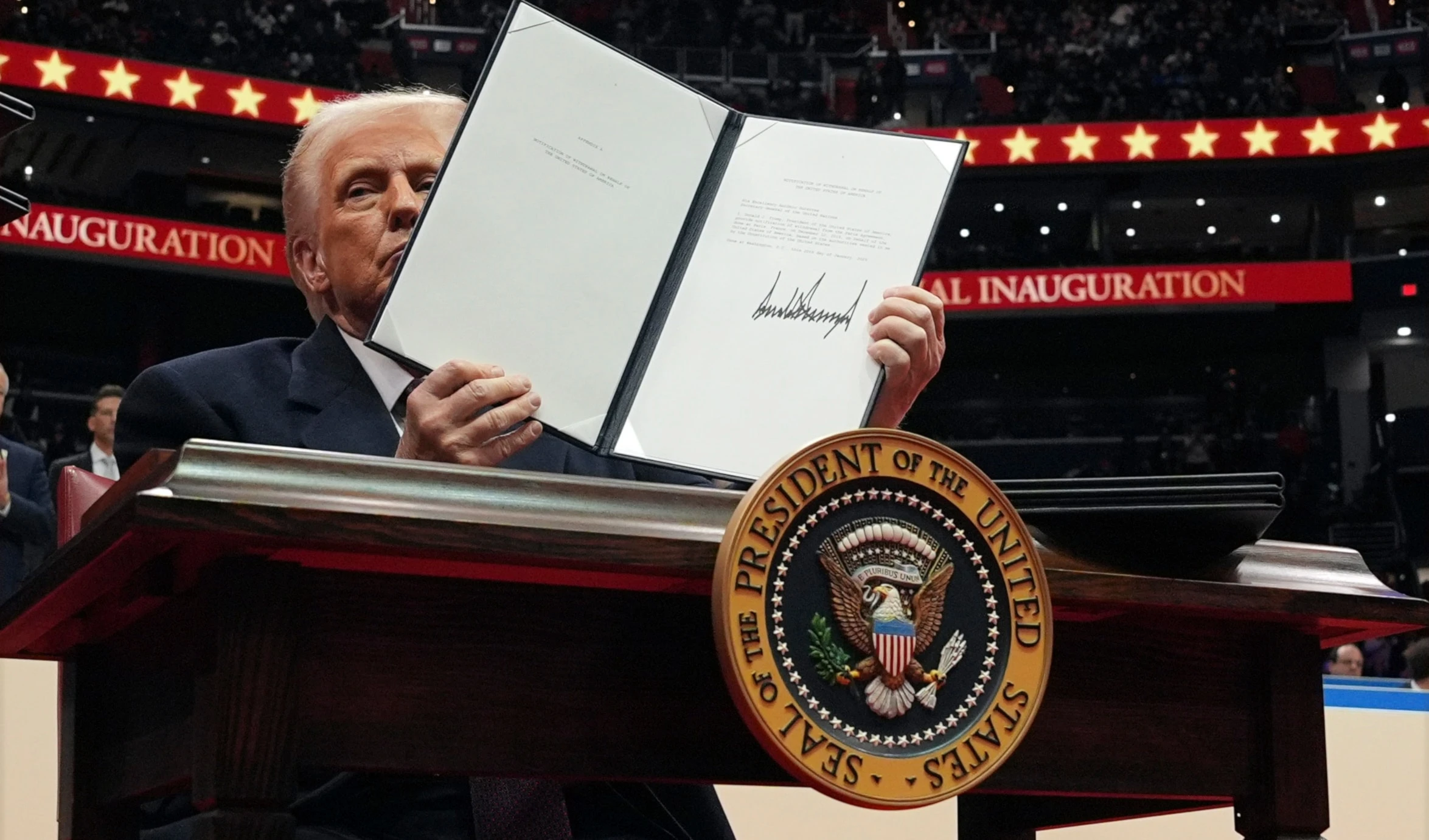 Trump signs key executive orders at Capital One Arena