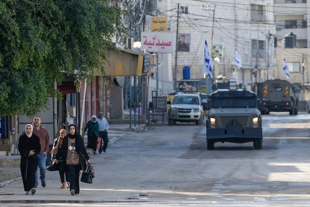 Israeli occupation forces vehicles are seen during a military operation in the West Bank city of Jenin, occupied Palestine, Tuesday, January 21, 2025 (AP)