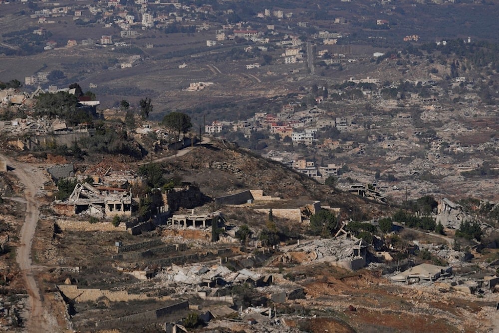 Destroyed buildings in an area of the village of Odaisseh in southern Lebanon, located next to the Palestinian-Lebanese border area, as seen from northern Israel, Dec. 5, 2024 (AP)