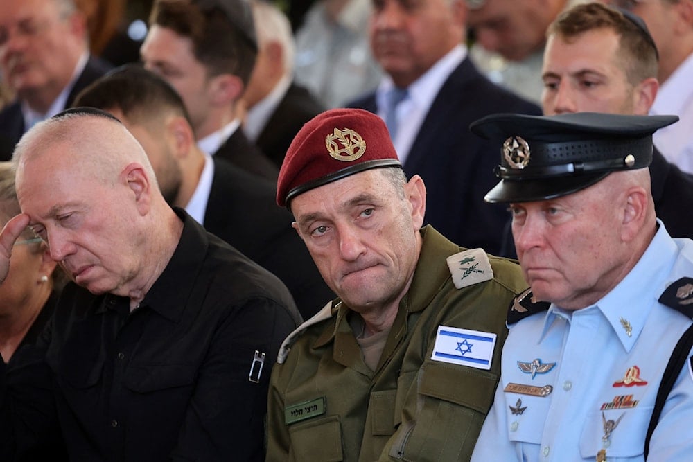 Israeli Chief of the General Staff Lieutenant-General Herzi Halevi (center) and then-Security Minister Yoav Gallant (left) attend a ceremony marking the Hebrew calendar anniversary of Al-Aqsa Flood, on Oct 27, 2024. (AFP0