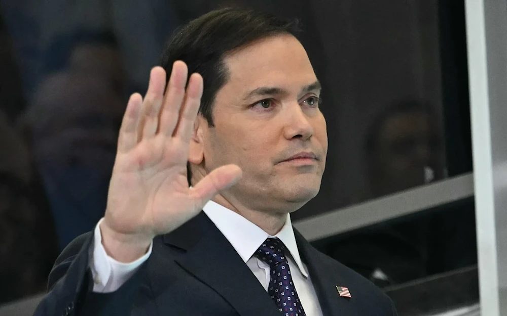 US Secretary of State Marco Rubio waves to employees upon arriving at the State Department in Washington, on January 21, 2025. (AFP)