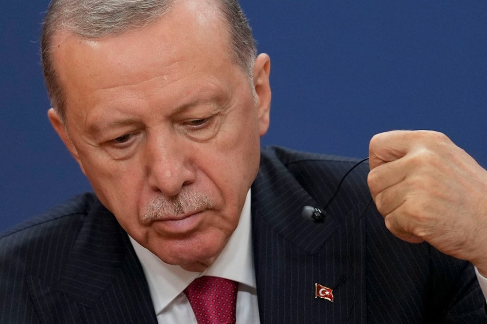 Turkey's President Recep Tayyip Erdogan listens to a question during a news conference after talks with his Serbian counterpart Aleksandar Vucic in Belgrade, Serbia, on October 11, 2024. (AP)