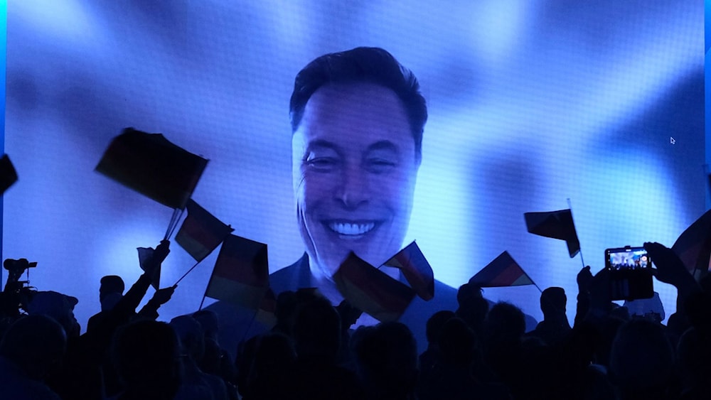 Elon Musk speaking via video link to a hall of around 4,500 Alternative for Germany (AfD) supporters in the central city of Halle. (AP)