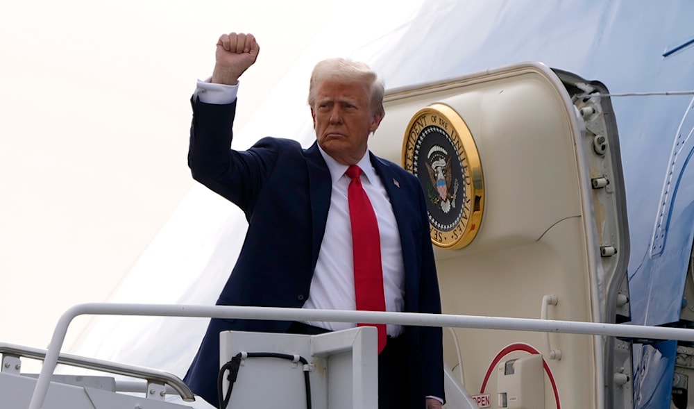 President Donald Trump gestures as he boards Air Force One en route to Florida at Harry Reid International Airport in Las Vegas, Saturday, Jan. 25, 2025. (AP)