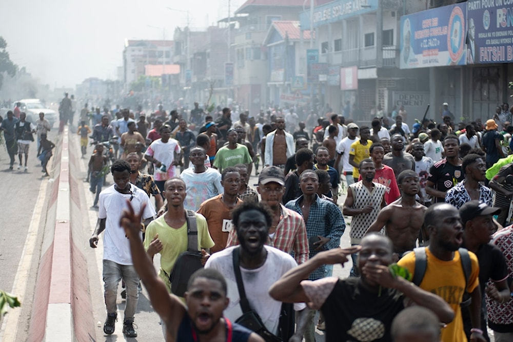 People protest in Kinshasa, Democratic Republic of the Congo (DRC) Tuesday, Jan. 28, 2025, against the Rwanda-backed M23 rebels' advances into eastern Congos capital Goma (AP)