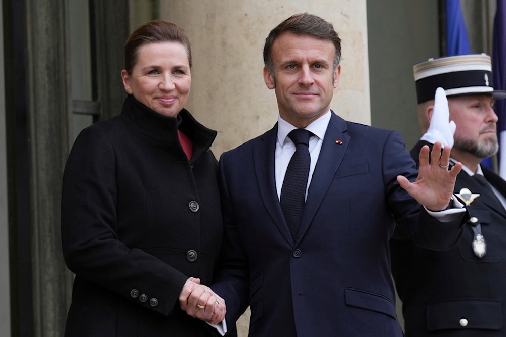 French President Emmanuel Macron welcomes Prime Minister of Denmark Mette Frederiksen before their talks, Tuesday, Jan. 28, 2025 at the Elysee Palace in Paris. (AP Photo/Aurelien Morissard)