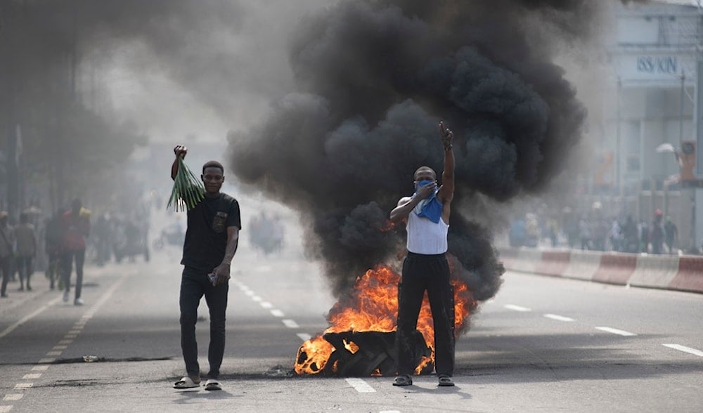 People protest in Kinshasa, Democratic Republic of the Congo Tuesday, Jan. 28, 2025, against the Rwanda-backed M23 rebels' advances into eastern Congo's capital Goma.(AP)