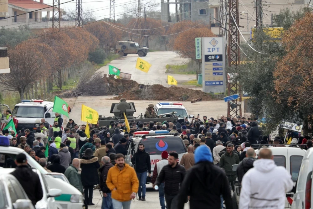 An Israeli military jeep behind an earthen barricade on a road leading to Kfar Kila in southern Lebanon, where residents gathered on January 26, 2025. (AFP - Getty Images)