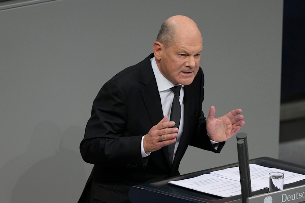 German Chancellor Olaf Scholz speaks at the beginning of a debate about migration at the German parliament Bundestag in Berlin, Germany, Wednesday, Jan. 29, 2025 (AP)