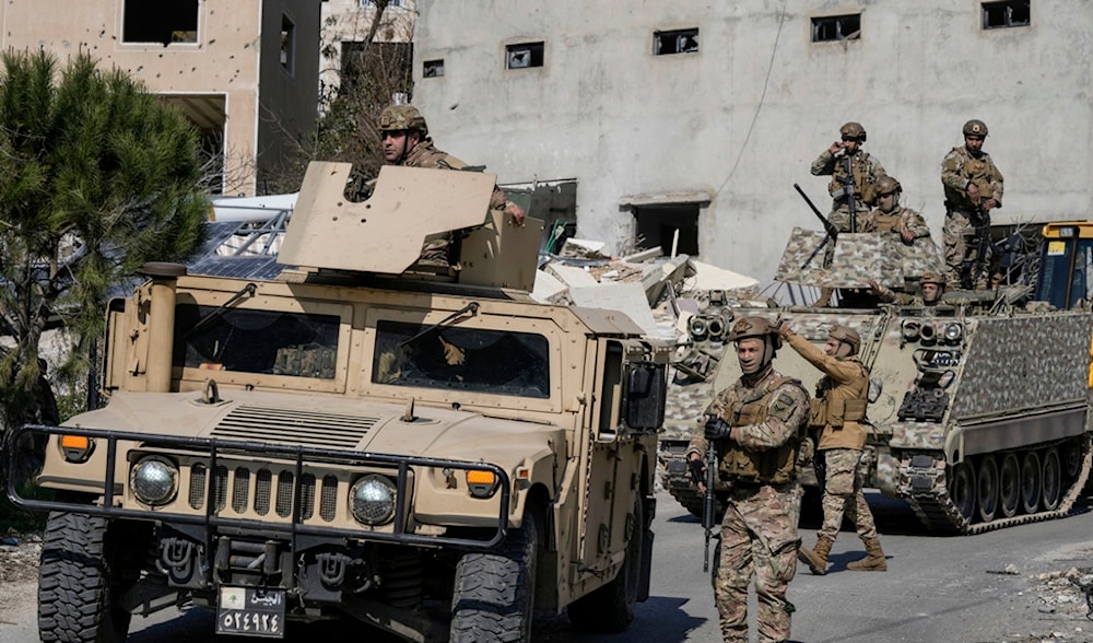 Lebanese soldiers enter a neighborhood in the southern Lebanese village of Aitaroun, Lebanon, Monday, Jan. 27, 2025. (AP)