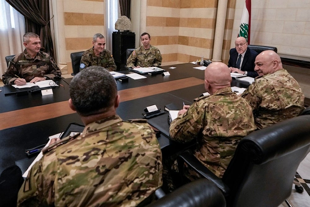 Lebanese caretaker Prime Minister Najib Mikati, second right, meets with the committee monitoring the Lebanese-Israeli ceasefire, at the government palace in Beirut, Lebanon, Tuesday, December 24, 2024 (AP)