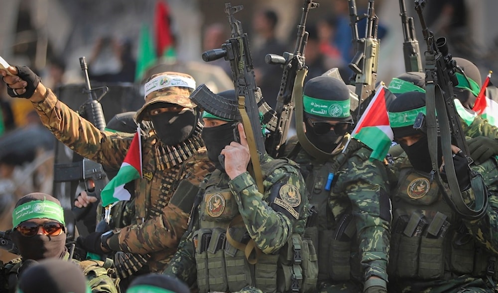 Hamas fighters arrive in a pick-up truck at the Jabalia refugee camp in Gaza City, Thursday Jan. 30, 2025.(AP)