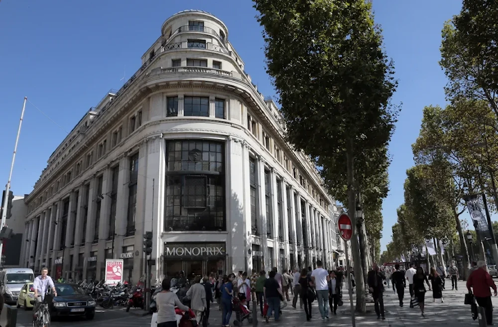 The Champs-Elysees packed with tourists. (AFP/Getty Images)