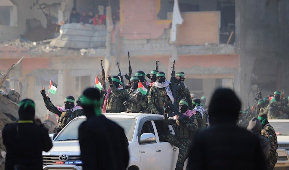 Hamas fighters are greeted as they arrive in pick-up trucks at the Jabalia refugee camp in Gaza City, Thursday Jan. 30, 2025.(AP)