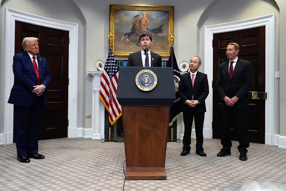 Sam Altman, OpenAI CEO, speaks as President Donald Trump Masayoshi Son, and Larry Ellison listen, in the Roosevelt Room at the White House, Tuesday, Jan. 21, 2025, in Washington (AP)