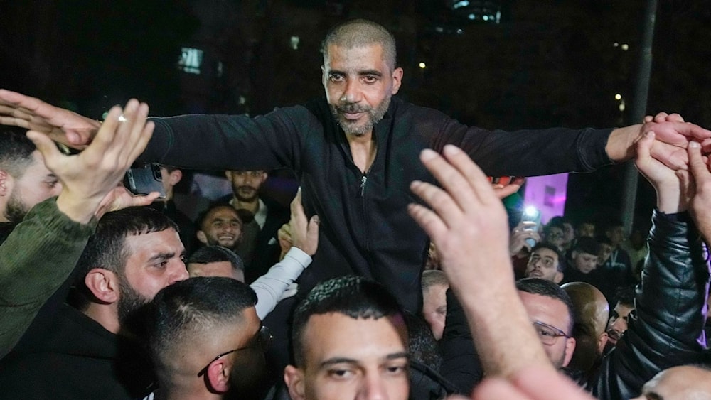 Zaharia Zubeidi is carried by supporters in Ramallah after being released from an Israeli prison. (AP