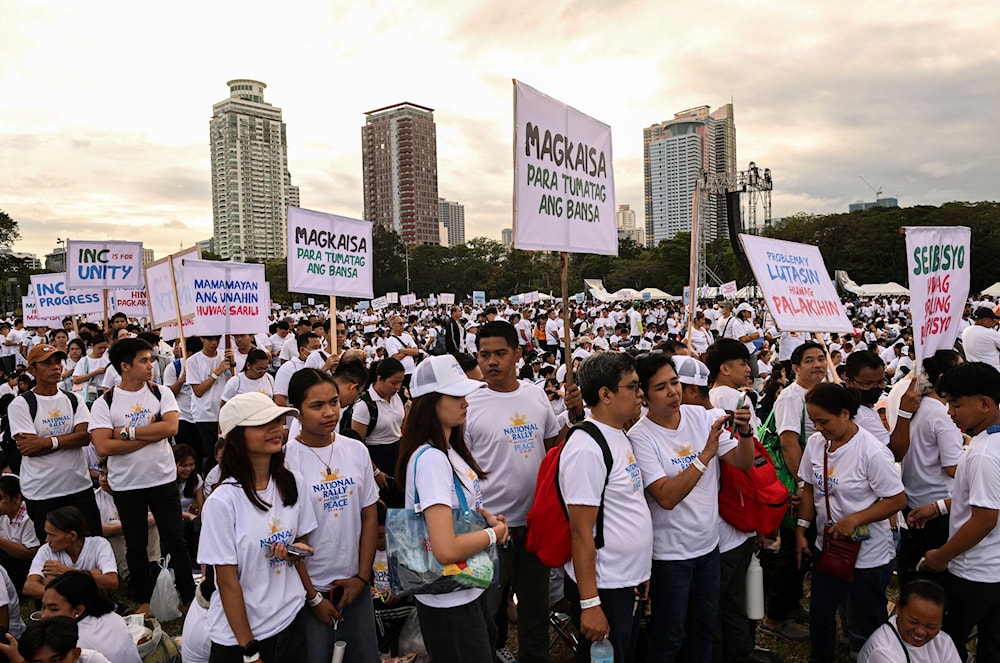 People participate in the National Rally for Peace organized by a religious group in support of Philippine Vice President Sara Duterte, who is facing impeachment complaints, in Manila, Philippines on January 13, 2025. (AP)