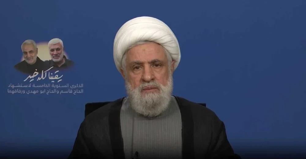 Hezbollah Secretary-General Sheikh Naim Qassem during a speech commemorating martyrs Hajj Qassem Soleimani and Abu Mahdi al-Muhandis on January 4, 2025 (Screengrab)