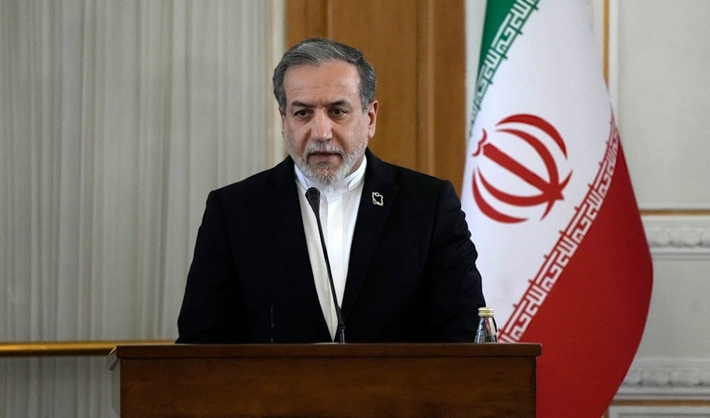 Iranian Foreign Minister Abbas Araghchi speaks in a joint press briefing with his Omani counterpart Sayyid Badr Albusaidi after their meeting in Tehran, Iran, Monday, Dec. 30, 2024. (AP)