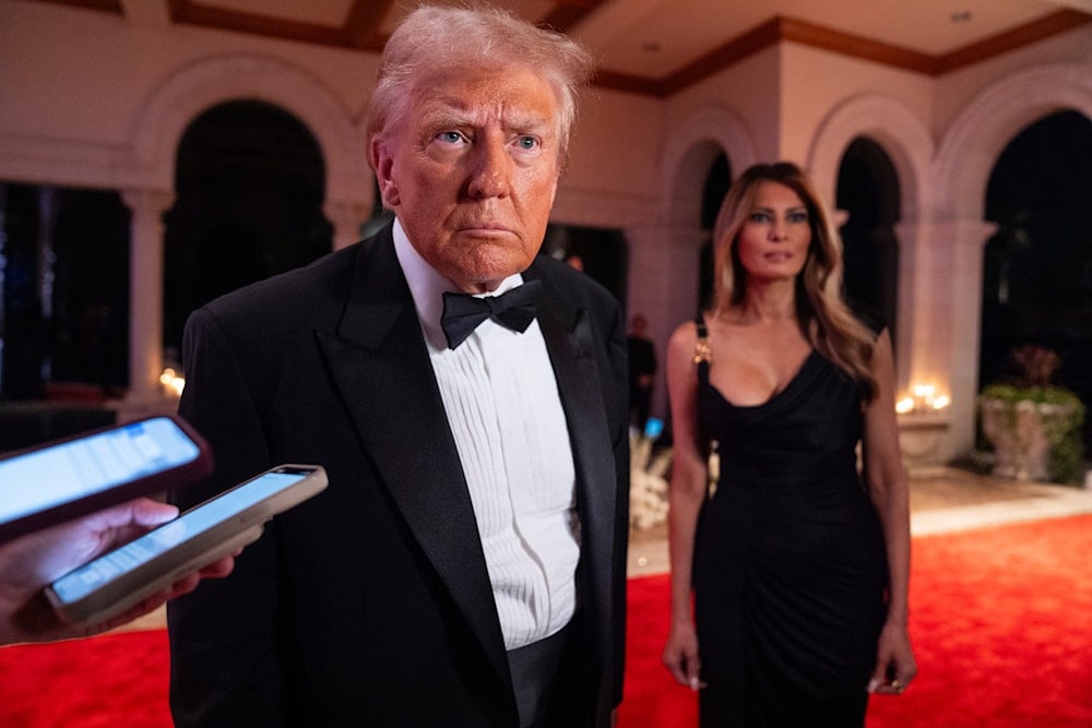  President-elect Donald Trump speaks to reporters before a New Year's Eve party at Mar-a-Lago, on December 31, 2024, in Palm Beach, Fla. (AP)