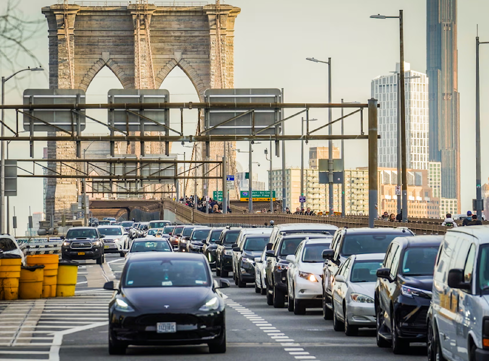 Traffic enters lower Manhattan after crossing the Brooklyn Bridge on 8 February 2024. (AP)