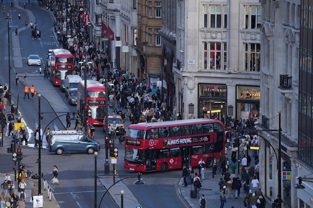 Traffic and pedestrians on Oxford Street in London, Tuesday, September 17, 2024 (AP)