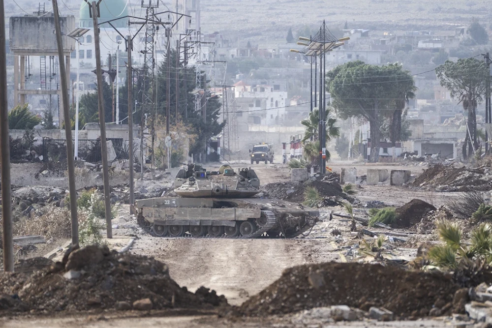 Israeli military armored vehicles block a road leading to the town of Quneitra, Syria, Sunday, January 5, 2025. (AP)