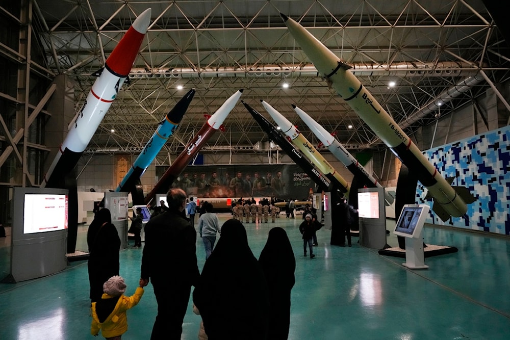 People visit the National Aerospace Park of the Islamic Revolution Guard Corps, showing the guard's aerospace achievements, just outside Tehran, Iran, Friday, November 15, 2024 (AP)