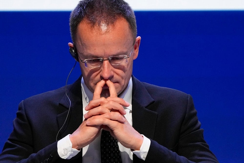 Hungary's Foreign Minister Peter Szijjarto attends a plenary session at the St. Petersburg International Gas Forum in St. Petersburg, Russia, Thursday, Oct. 10, 2024 (AP)