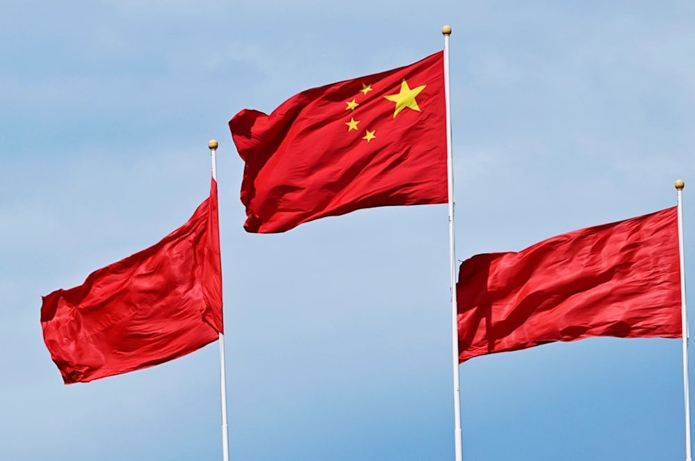 China's national flags flutter during the Forum on China-Africa Cooperation (FOCAC) summit at the Great Hall of the People in Beijing, Thursday, Sept. 5, 2024. (AP)