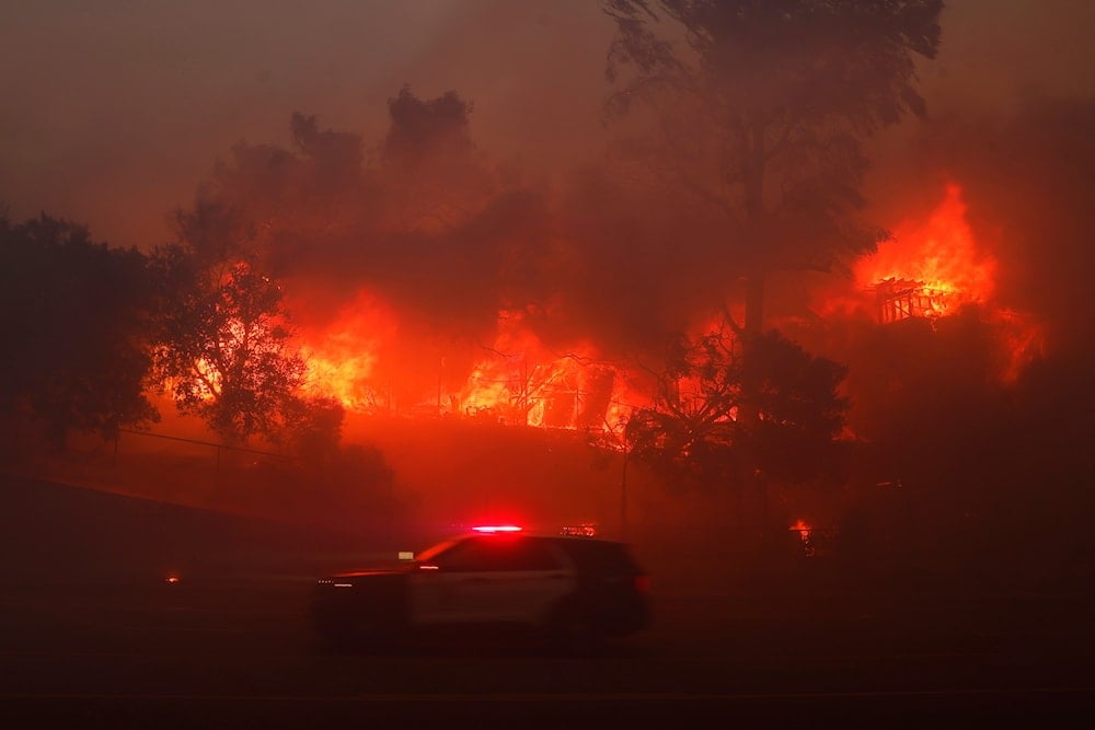 The Palisades Fire burns a property in the Pacific Palisades neighborhood of Los Angeles, on January 7, 2025. (AP)