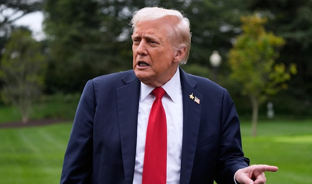 President Donald Trump speaks with reporters as he walks from Marine One after arriving on the South Lawn of the White House, Tuesday, Sept. 30, 2025, in Washington. (AP)