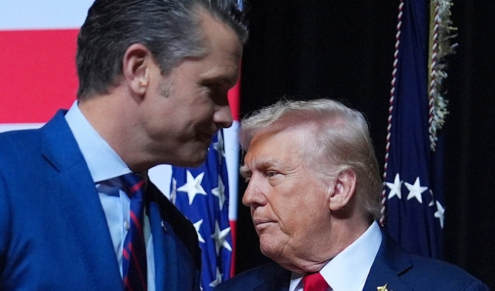 President Donald Trump is greeted by Secretary of Defense Pete Hegseth before speaking to a gathering of top U.S. military commanders at Marine Corps Base Quantico, Sept. 30, 2025, in Quantico, Va. (AP)